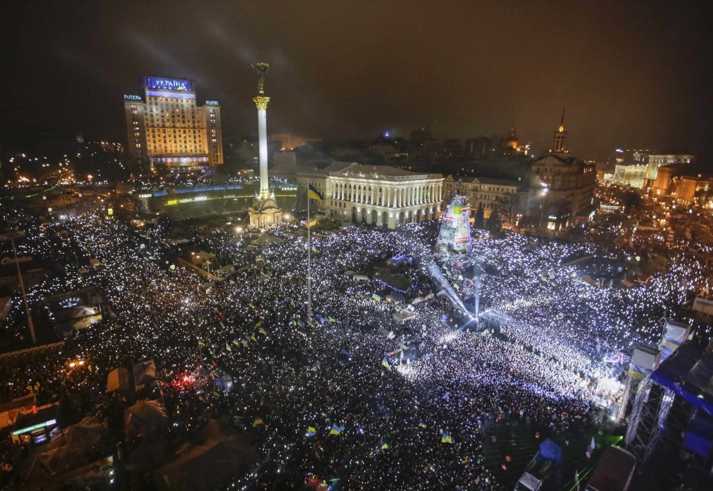 Pro-European integration supporters take part in New Year celebrations in Independence Square in central Kiev